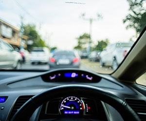 Steering wheel with blurry windshield